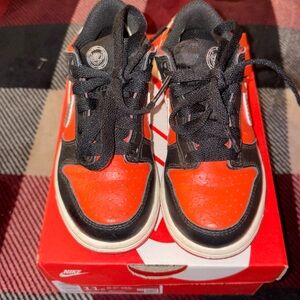 Orange and silver Nike dunk low